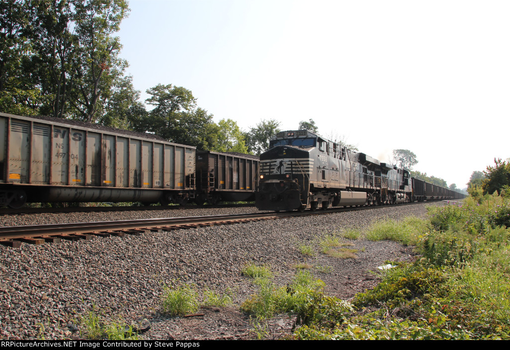 NS 7558 leads train 597 down the siding at Milepost 116